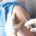 Patient having a vaccine shot